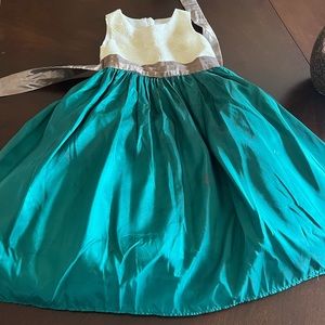 Brand new kids size 6x or 7 satin dress.